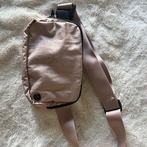 Lululemon pink on the move purse pack. This colour is not available anymore!